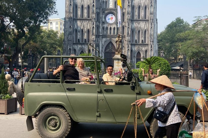Vintage Jeep tour exploring Hanoi's highlights, including Train Street, local life, and scenic lakes, photo 20 | wizardtrip
