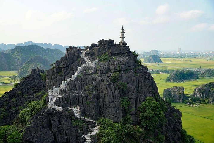 Full-day tour from Hanoi to Ninh Binh visiting Hoa Lu, Trang An, and Mua Cave with cycling, photo 20 | wizardtrip