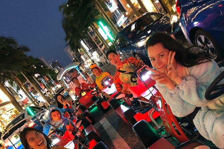 Gade-gokart-eventyr i Naha, Okinawa, med udklædte chauffører, der udforsker byens gader, foto 6 | wizardtrip