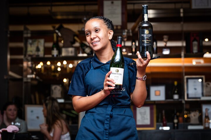 Paisagens cénicas de vinhedos e experiências de degustação de vinhos nas Regiões Vinícolas do Cabo, África do Sul, foto 6 | wizardtrip
