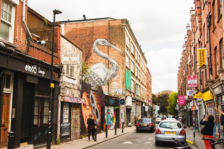 Une visite gastronomique animée dans l'East End historique de Londres, proposant des délices culinaires variés et du street art, photo 11 | wizardtrip