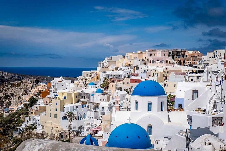 Tour privado personalizado pelos destaques de Santorini, incluindo Oia, cúpulas azuis e praias, foto 6 | wizardtrip