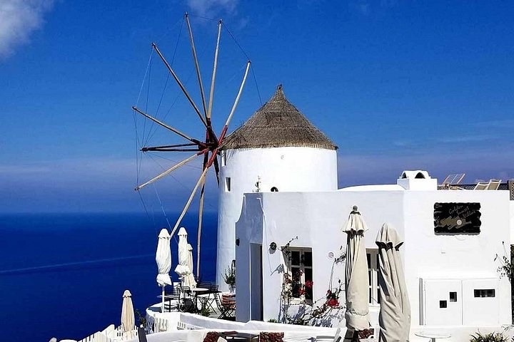 Tour privado personalizado pelos destaques de Santorini, incluindo Oia, cúpulas azuis e praias, foto 15 | wizardtrip