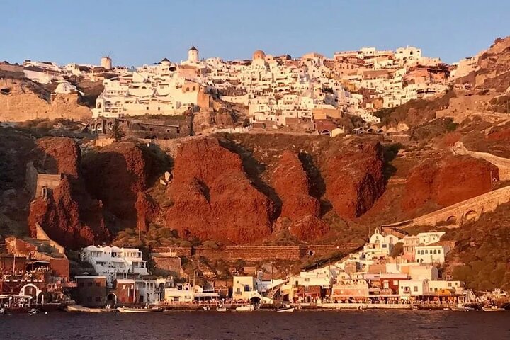 Cruzeiro de catamarã de luxo em Santorini com paragens para nadar, refeição grega e vistas do pôr do sol, foto 7 | wizardtrip