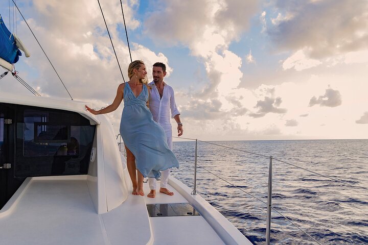 Luxury catamaran sailing at sunset along the Riviera Maya coast, Mexico, photo 6 | wizardtrip