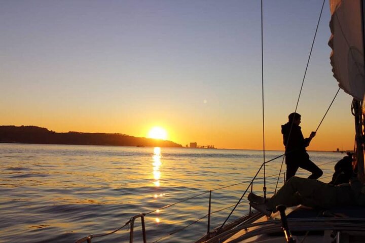 Enjoy a scenic sailboat cruise on Lisbon's Tagus River, viewing landmarks like Belém Tower, photo 14 | wizardtrip