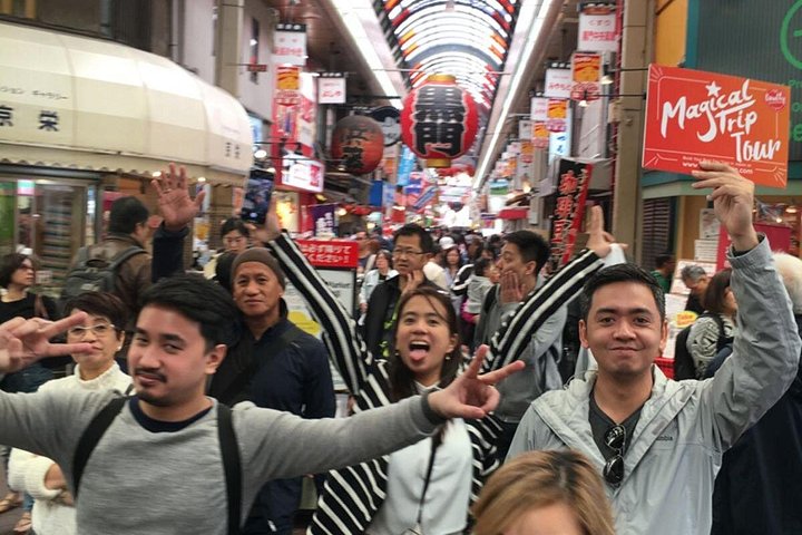 Un tour gastronómico guiado que explora el vibrante Mercado Kuromon y el distrito de Dotonbori en Osaka, con delicias locales, foto 9 | wizardtrip