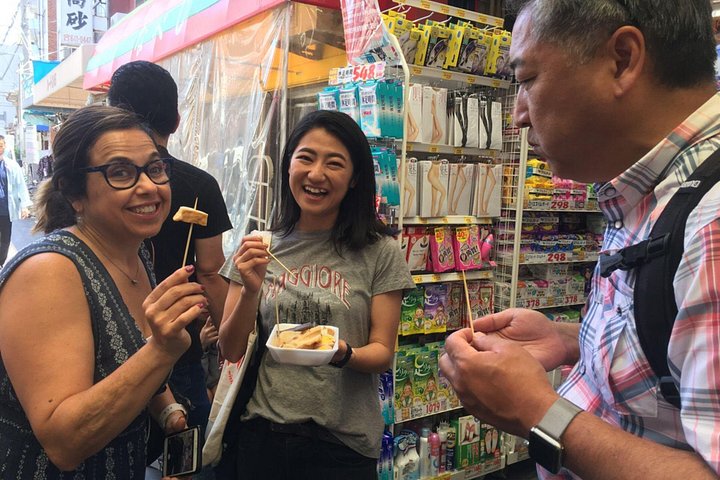 Un tour gastronómico guiado que explora el vibrante Mercado Kuromon y el distrito de Dotonbori en Osaka, con delicias locales, foto 19 | wizardtrip