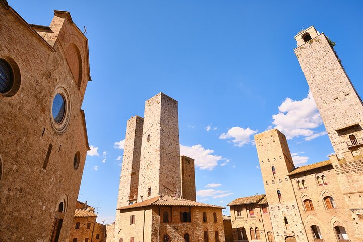 Day trip from Florence to Siena, San Gimignano, and Pisa, featuring Tuscan landscapes, medieval towns, and the Leaning Tower, photo 32 | wizardtrip