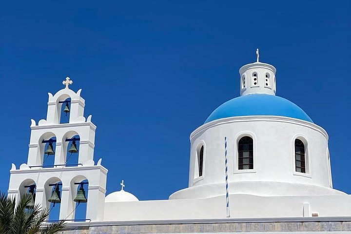 Santorini shore excursion featuring blue-domed churches, Oia village, and black sand beaches, photo 17 | wizardtrip