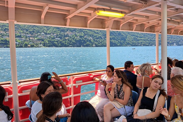 Viste panoramiche del Lago di Como, incluse cittadine come Bellagio e Como, con barche sull'acqua, foto 27 | wizardtrip