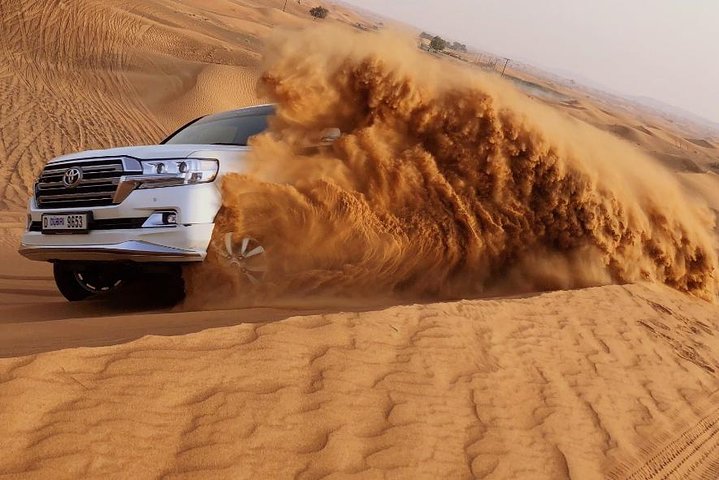Privat morgensafari i Dubais ørken med sanddyne-bashing, kamelridning og sandboarding, foto 8 | wizardtrip