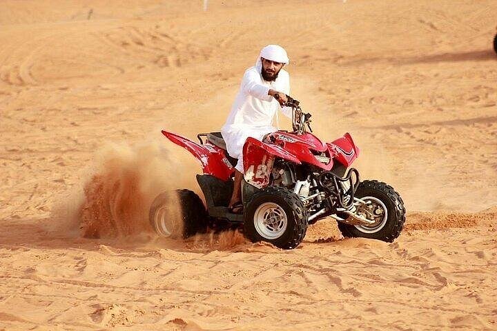Safari du soir dans les dunes rouges de Dubaï, Quad, BBQ et Camp Premium | wizardtrip
