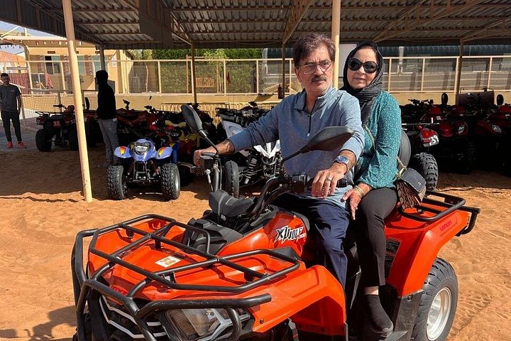 Experience a thrilling Dubai desert safari with quad biking, sandboarding, camel rides, and a BBQ dinner, photo 24 | wizardtrip