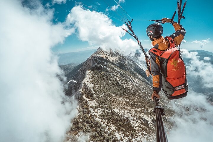 Découvrez le parapente en tandem au-dessus des magnifiques eaux turquoise et du littoral d'Ölüdeniz, en Turquie, photo 7 | wizardtrip
