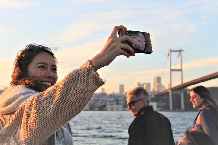 Luxury yacht cruise on Istanbul's Bosphorus at sunset, offering city views and refreshments, photo 6 | wizardtrip