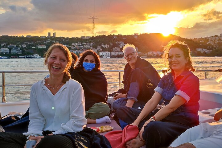 Luxury yacht cruise on Istanbul's Bosphorus at sunset, offering city views and refreshments, photo 15 | wizardtrip