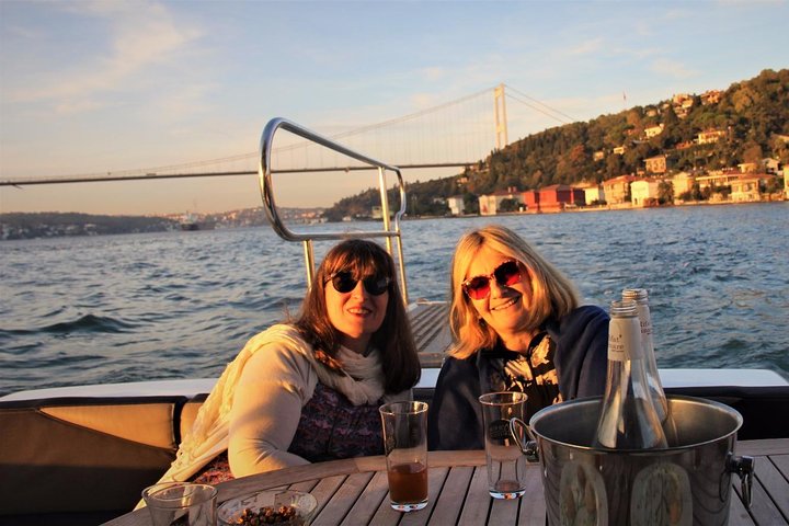 Luxury yacht cruise on Istanbul's Bosphorus at sunset, offering city views and refreshments, photo 20 | wizardtrip