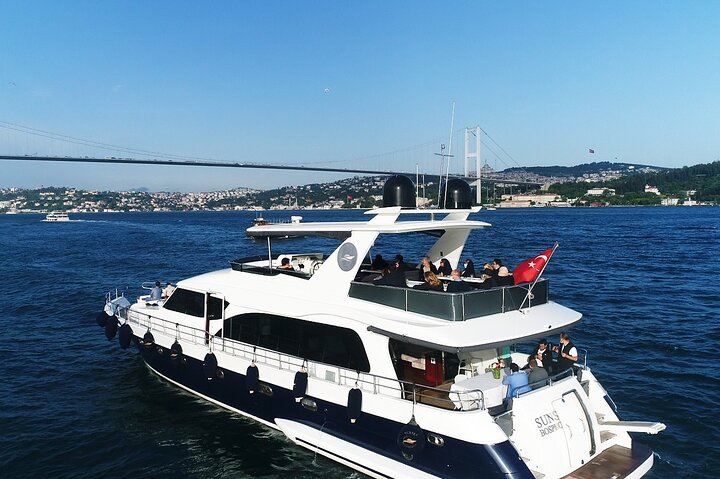 Luxury yacht cruise on Istanbul's Bosphorus at sunset, offering city views and refreshments, photo 28 | wizardtrip
