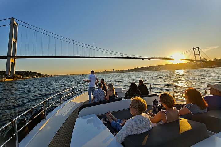Luxury yacht cruise on Istanbul's Bosphorus at sunset, offering city views and refreshments, photo 37 | wizardtrip