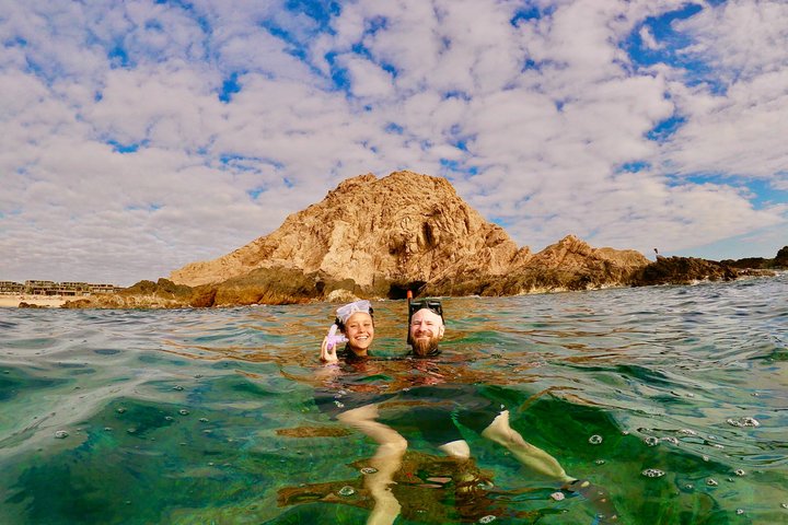 Snorkelers exploring vibrant coral reefs and diverse marine life in the clear waters of Cabo San Lucas, photo 13 | wizardtrip