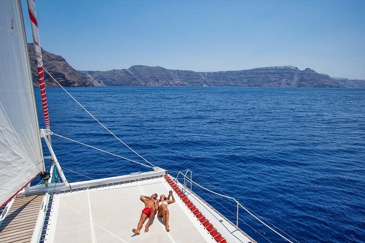 Santorini Catamaran Sailing Cruise with BBQ, Drinks & Transfer | wizardtrip