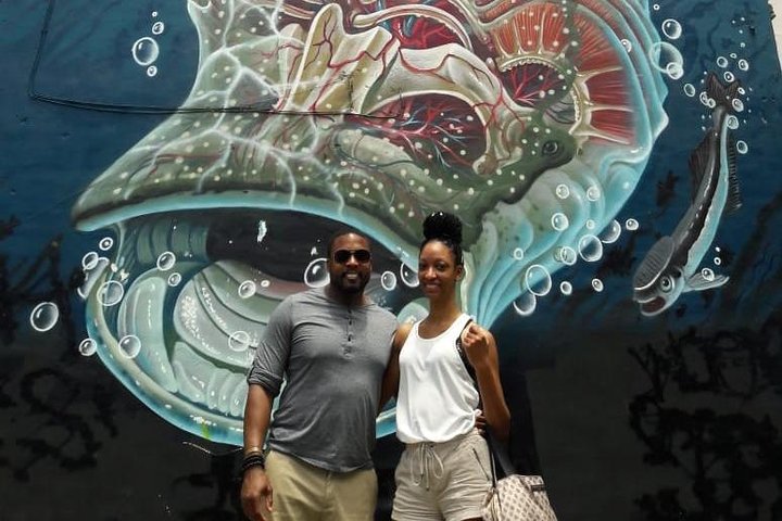 Tour de Street Food à Cancun avec stands, marché local et fresques murales | wizardtrip