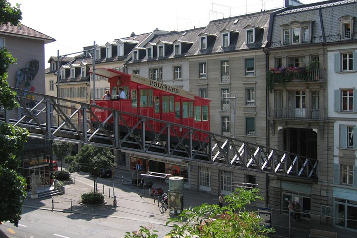 Panoramic views of Zurich city, Lake Zurich, and the Alps from a mountain viewpoint, photo 10 | wizardtrip