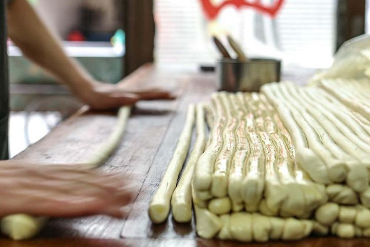 Tour gastronômico noturno em Xi'an de tuktuk, explorando culinária e cultura local, foto 6 | wizardtrip