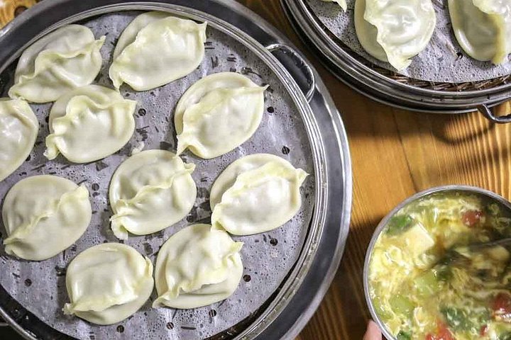 Tour gastronômico noturno em Xi'an de tuktuk, explorando culinária e cultura local, foto 7 | wizardtrip