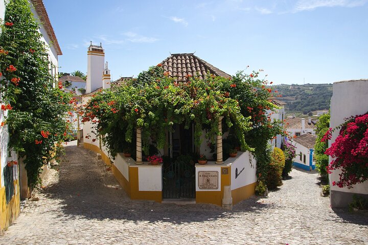 Kleine groepsdagtour vanuit Lissabon naar Fatima, Nazare en Obidos, met religieuze plaatsen, kustuitzichten en middeleeuwse dorpjes, foto 13 | wizardtrip