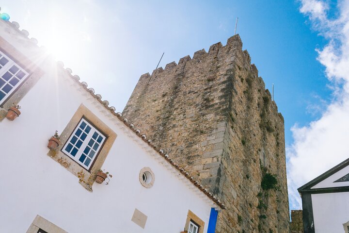 Kleine groepsdagtour vanuit Lissabon naar Fatima, Nazare en Obidos, met religieuze plaatsen, kustuitzichten en middeleeuwse dorpjes, foto 16 | wizardtrip
