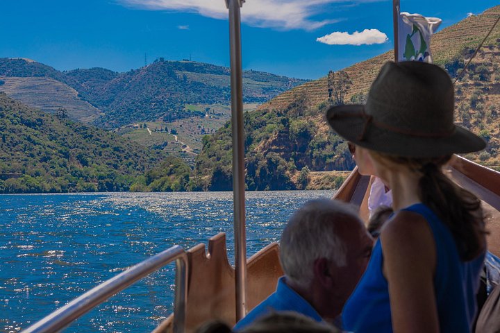 Scenic Douro Valley tour from Porto featuring vineyards, river cruise, wine tasting, and historical sites, photo 19 | wizardtrip
