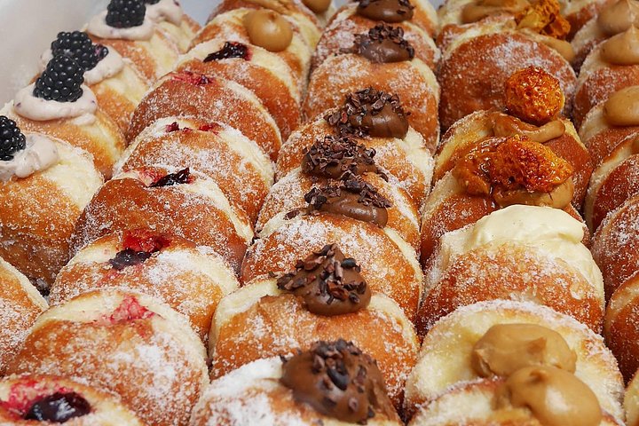 Um tour gastronómico guiado explorando o London Bridge e o Borough Market, com pratos britânicos icónicos e sabores locais, foto 8 | wizardtrip