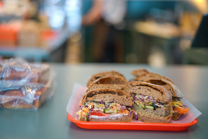 Montreal Mile End food tour tasting bagels, poutine, and smoked meat, photo 6 | wizardtrip