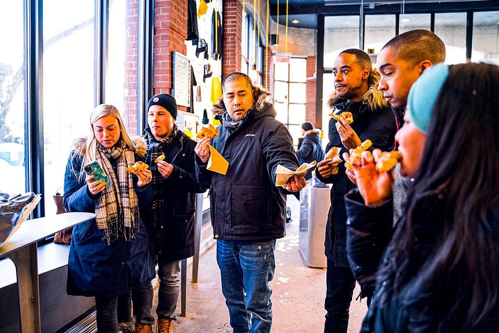 Montreal Mile End food tour tasting bagels, poutine, and smoked meat, photo 15 | wizardtrip