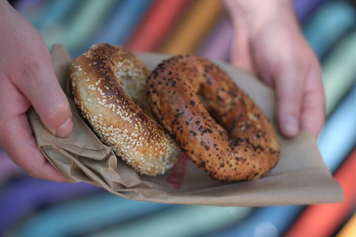 Montreal Mile End food tour tasting bagels, poutine, and smoked meat, photo 21 | wizardtrip