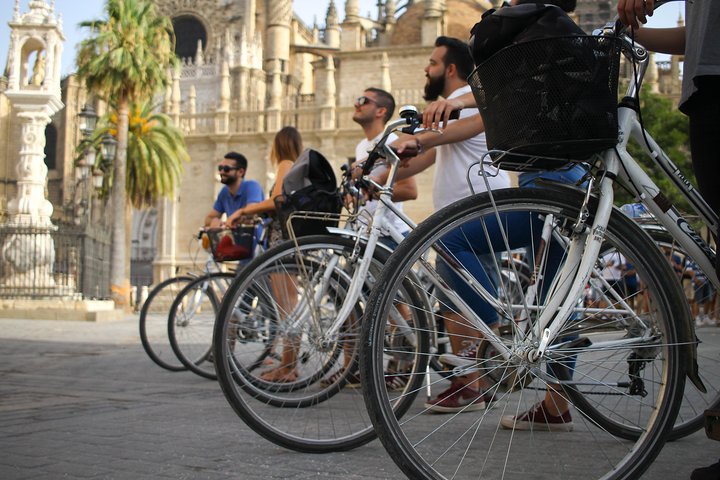 Guided bike tour exploring Seville's historic landmarks and charming neighborhoods, photo 6 | wizardtrip