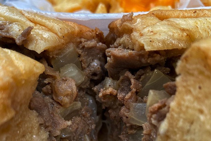 A guided food tour in Philadelphia featuring iconic local dishes and historic market exploration, photo 8 | wizardtrip