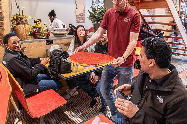 A guided food tour in Philadelphia featuring iconic local dishes and historic market exploration, photo 10 | wizardtrip