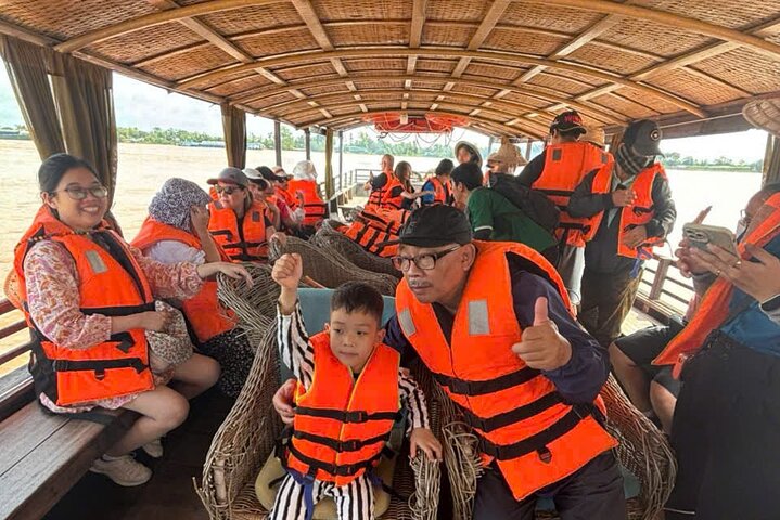 Explore o vibrante Delta do Mekong com seus mercados flutuantes, paisagens exuberantes e encontros culturais, foto 24 | wizardtrip
