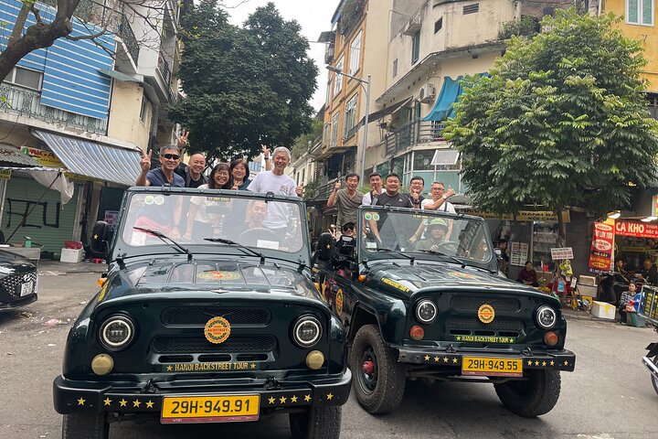 Experience Hanoi's vibrant culture and cuisine from a vintage army jeep, exploring streets and tasting local food, photo 7 | wizardtrip