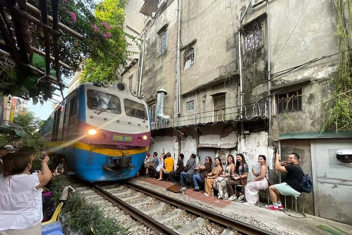 Experience Hanoi's vibrant culture and cuisine from a vintage army jeep, exploring streets and tasting local food, photo 8 | wizardtrip