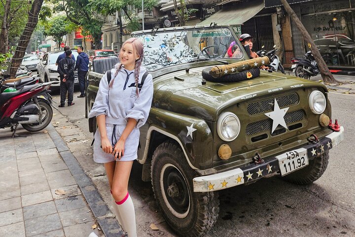 Experience Hanoi's vibrant culture and cuisine from a vintage army jeep, exploring streets and tasting local food, photo 9 | wizardtrip