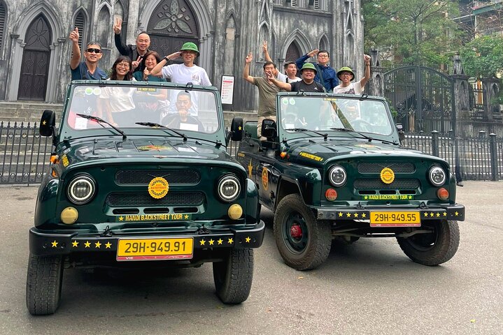 Experience Hanoi's vibrant culture and cuisine from a vintage army jeep, exploring streets and tasting local food, photo 16 | wizardtrip