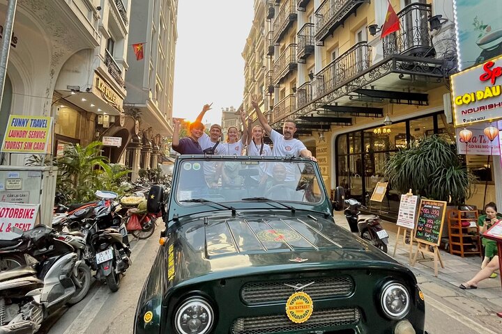 Experience Hanoi's vibrant culture and cuisine from a vintage army jeep, exploring streets and tasting local food, photo 26 | wizardtrip