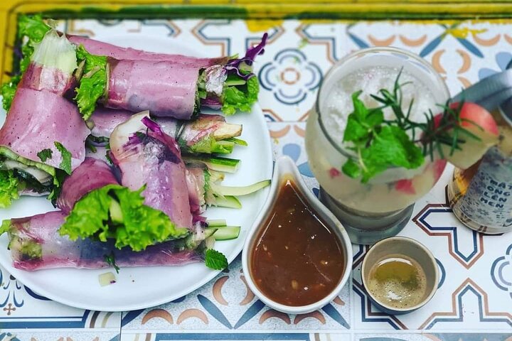 Experience Hanoi's vibrant culture and cuisine from a vintage army jeep, exploring streets and tasting local food, photo 28 | wizardtrip
