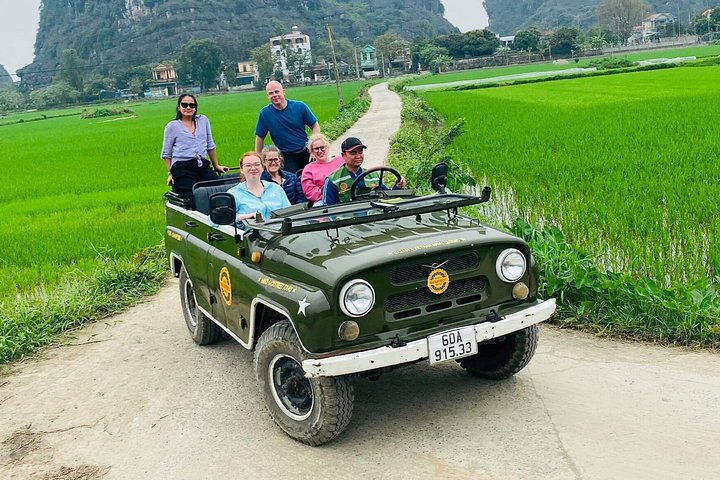 Scenic boat ride through limestone karsts and rice paddies in Ninh Binh, Vietnam, photo 15 | wizardtrip
