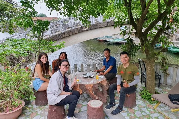 Scenic boat ride through limestone karsts and rice paddies in Ninh Binh, Vietnam, photo 31 | wizardtrip