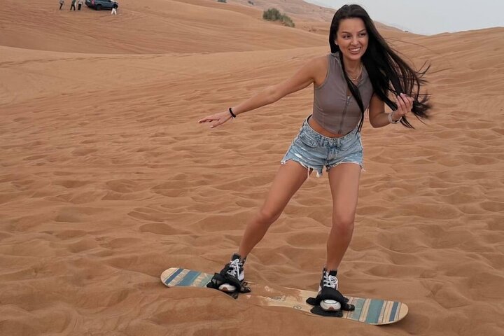 Evening desert safari in Dubai with dune bashing, quad biking, camel rides, and BBQ dinner, photo 6 | wizardtrip